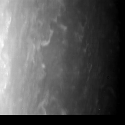 White ice-clouds on Saturn's upper atmosphere (2)
Original caption:"N00047654.jpg was taken on January 02, 2006 and received on Earth January 03, 2006. The camera was pointing toward Saturn that, at the time, was approximately 2.732.434 Km away, and the image was taken using the CL1 and CL2 filters. This image has not been validated or calibrated".

Note: anche questa seconda immagine (molto suggestiva) ci mostra che, negli strati superiori dell'atmosfera di Saturno, sembra esserci spazio per il passaggio di nuvole bianche - presumibilmente formate da ghiaccio d'acqua - le quali, nelle loro caratteristiche esteriori, ci ricordano i cirri ed i cirro-strati che, di tanto in tanto, vediamo anche nei nostri cieli. 
Se, al di sotto di queste nuvole, piova o nevichi, non ci è dato saperlo ma, a quanto sembra, questa possibilità - già verificata per le nuvole di Giove - è tutt'altro che remota.
Parole chiave: Saturn - Atmosphere - upper layers