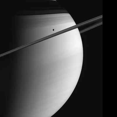 Saturn and Tethys
Original caption:"Saturn poses with Tethys in this Cassini view. The C ring casts thin, string-like shadows on the Northern Hemisphere. Above that lurks the shadow of the much denser B-Ring. Cloud bands in the atmosphere are subtly visible in the south. Tethys is 1071 Km (about 665 miles) across. 
Cassini will perform a close flyby of Tethys on Sept. 24, 2005. This image was taken on June 10, 2005, in visible green light with the Cassini spacecraft wide-angle camera at a distance of approx. 1,4 MKM (such as about 900.000 miles) from Saturn. The image scale is 81 Km (about 50 miles) per pixel".
Parole chiave: Saturn and Tethys