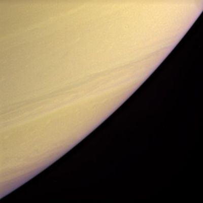 Saturn's limb (enhanced - and yet natural - colors)
Original caption:"Twice as far from the Sun as Jupiter, Saturn's colder temperatures mean that clouds form lower in its atmosphere. As a result, the visible cloud patterns - so striking on Jupiter - occur deeper inside Saturn, reducing their visibility in natural color views. 
This enhanced-color view uses exaggerated contrast and intensity in order to make Saturn's cloud bands easy to see. 
The Latitude seen at the image center is approximately 60° South of the Equator. 

Images taken in blue (BL2), green and red (CB1) polarized spectral filters were combined to create this enhanced-color view. The images were taken with the Cassini spacecraft narrow-angle camera on Dec. 7, 2005, at a distance of approximately 3,1 MKM (1,9 MMs) from Saturn. The image scale is about 36 Km (app.x 22 miles) per pixel".
Parole chiave: Saturn - Atmosphere - upper layers