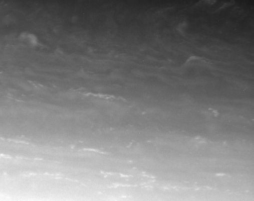 Restless Atmosphere (1)
This atmosphere close-up shows bright clouds in Saturn's Northern Hemisphere being sheared apart. The clouds at the bottom of the image are tilted and stretched because the wind at those lower latitudes is moving much faster to the East than the wind at the higher latitudes near the top of the image, hence the shear. 
This appearance suggests that these bright eddies are passive tracers of the atmosphere's motion - they appear, probably as a result of upwelling due to convection from below, and then they are sheared apart. 

The image was taken in visible light with the Cassini spacecraft narrow-angle camera on Feb. 16, 2006, at a distance of approximately 3,3 MKM (about 2 MMs) from Saturn. The image scale is roughly 19 Km (about 12 miles) per pixel.
Parole chiave: Saturn - Atmosphere - upper layers