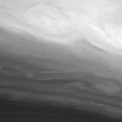 A "Clash of Clouds" in Saturn's upper atmosphere
Caption NASA originale:"The Cassini spacecraft presents a tempestuous scene in which the clouds of Saturn's bright Equatorial Region entwine with those in darker, Southerly Latitudes. 

The image was taken using a filter sensitive to wavelengths of infrared light centered at 890 nanometers. The image was acquired with the Cassini spacecraft wide-angle camera on Aug. 16, 2006 at a distance of approx. 289.000 Km (about 180.000 miles) from Saturn. Image scale is roughly 14 Km (such as about 8 miles) per pixel".
Parole chiave: Saturn - Upper Atmosphere