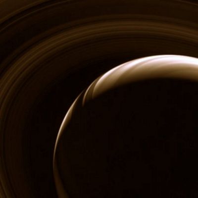 Saturn: the Ringed Beauty
Caption NASA:"(...) This infrared view from high above Saturn's Ring-Plane highlights the contrast in the cloud bands, the dimly glowing rings and their shadows on the Gas Giant Planet. The overall effect is stirring. 
This view looks toward the unlit side of the Rings from about 48° above the Ring-Plane. 

The image was taken with the Cassini spacecraft wide-angle camera using a combination of spectral filters sensitive to wavelengths of polarized infrared light. 
The view was obtained on Feb. 12, 2007 at a distance of approx. 1,7 MKM (about 1 MMs) from Saturn and at a Sun-Saturn-spacecraft, or phase, angle of 144°. 
Image scale is roughly 191 Km (about 119 miles) per pixel".
Parole chiave: Saturn