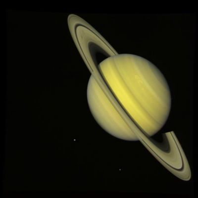 Saturn from approx. 33.900.000 Km - Voyager 2
Caption NASA originale:"NASA's Voyager 2 took this 'true color' photograph of Saturn on July 21, 1981, when the spacecraft was 33.900.000 Km from the planet. Two bright, presumably convective cloud patterns are visible in the mid-northern hemisphere and several dark spoke-like features can be seen in the broad B-ring (left of planet). The moons Rhea and Dione appear as blue dots to the south and southeast of Saturn, respectively. Voyager 2 made its closest approach to Saturn on Aug. 25, 1981".
Parole chiave: Saturn