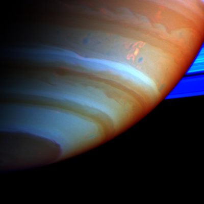 Saturn "dragon-storm" (false colors/near infrared)
Da "NASA - Picture of the Day" del 25 Febbraio 2005:"Dubbed the "Dragon Storm", convoluted, swirling cloud features are tinted orange in this false-color, near-infrared image of Saturn's Southern Hemisphere. In one of a series of discoveries announced by Cassini researchers, the Dragon Storm was found to be responsible for mysterious bursts of radio static monitored by Cassini instruments during the last year as the spacecraft orbited the ringed planet. The storm is now thought to be a giant Saturnian thunderstorm, like storms on Earth, with radio noise produced in high-voltage lightning discharges. The Cassini observations are also consistent with the Dragon Storm being a long-lived storm, deep within the gas giant's atmosphere, that periodically flares-up to produce large, visible storm regions".
Parole chiave: Saturn