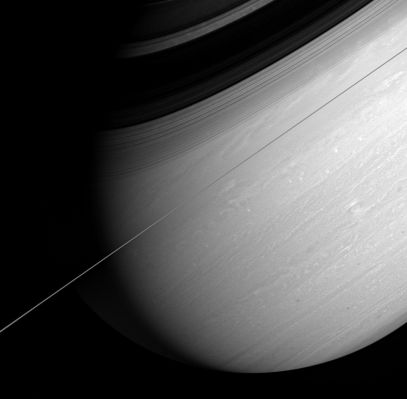 Tilted Saturn
Caption NASA originale:"Saturn's whirling vortices and feathery cloud bands are the signs of a restless world. Cassini captured this arresting view of the giant planet scored by bold shadows cast by the rings. The rings are seen edge-on in this dramatic, artfully tilted scene. 
The image was taken with the Cassini spacecraft wide-angle camera on March 6, 2005, at a distance of approx. 1,7 MKM (1 MMs) from Saturn through a filter sensitive to wavelengths of infrared light centered at 750 nnmts. The image scale is 10 Km per pixel".
Parole chiave: Saturn
