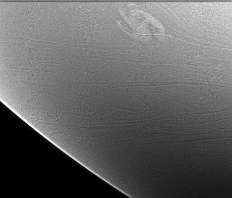 Turbulence... (1)
This image shows a rare and powerful storm on the Night-Side of Saturn. 
Light from Saturn's Rings (called "Ringshine") provided the illumination, allowing the storm and other cloud features to be seen. 
The storm is a possible source of radio emissions believed to come from electrical discharges (lightning) deep in Saturn's atmosphere. Cassini began detecting the radio emissions, which are like those from lightning, on January 23, 2006. At about the same time, amateur astronomers reported that a storm had appeared in Saturn's Southern Hemisphere at Lat. - 35°. Cassini was in the wrong place to take good images of the storm on the day side, since the Planet showed only a thin crescent to the spacecraft, but night side imaging was possible using light from the Rings.
The image shows the storm as it appeared to the Cassini imaging system on January 27, 2006, and the storm's North-South dimension is about 3.500 Km (approx. 2.175 miles).
Parole chiave: Saturn - Atmosphere - upper layers