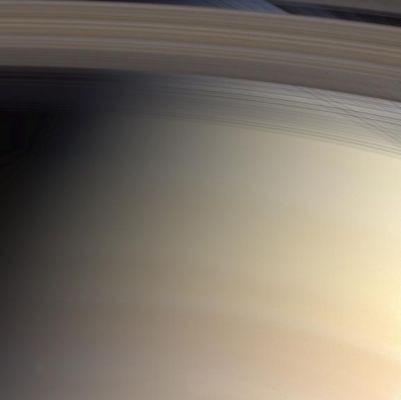 Saturn's Rings in natural colors from Cassini-Huygens
Caption NASA originale:Saturn's faintly banded atmosphere is delicately colored and its threadbare rings cross their own shadows in this marvelous natural color view from Cassini. 
The planet and its rings would nearly fill the space between Earth and the Moon. Yet, despite their great breadth, the rings are a few meters thick and in some places, very translucent. In this image, we can see through the C-Ring, which is closest to Saturn, and through the Cassini division, the 4.800-Km wide gap that arcs across the top of the image and separates the optically thick B-Ring from the A-Ring. The part of the atmosphere seen through the gap appears darker and more bluish due to scattering at blue wavelengths by the cloud-free upper atmosphere. 
The different colors in Saturn's atmosphere are due to particles whose composition is yet to be determined. 
The image was obtained with the Cassini spacecraft narrow angle camera on July 30, 2004, at a distance of 7.6 MKM from Saturn".
Parole chiave: Saturn's Rings