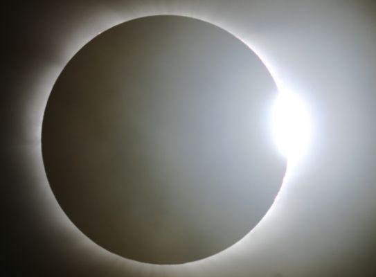 The "Diamond Ring"
Da "NASA - Picture of the Day" del 30 Marzo 2006:"The track of totality for the first solar eclipse of 2006 began early yesterday on the East coast of Brazil and ended half a world away at sunset in Western Mongolia. In between, the shadow of the Moon crossed the Atlantic Ocean, Northern Africa, central Asia and so came for a moment to the small Greek island of Kastelorizo in the Eastern Aegean. 
Astronomer Anthony Ayiomamitis reports that the islanders and many eclipse-watching visitors were indeed treated to an inspiring display of the beautiful Solar Corona as totality lasted about 3 minutes. 
As the total phase of the eclipse ended, he was able to capture this striking "Diamond Ring" image. In it, the first rays of sunlight shining through edge-on lunar valleys create the fleeting appearance of glistening diamonds set in a bright ring around the Moon's silhouette".
Parole chiave: The Sun - Amatorial Pictures