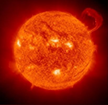 Solar Flares from Soho
Caption NASA originale:"Extreme Ultraviolet Imaging Telescope (EIT) image of a huge, handle-shaped prominence taken on Sept. 14,1999 taken in the 304 angstrom wavelength - Prominences are huge clouds of relatively cool dense plasma suspended in the Sun's hot, thin corona. At times, they can erupt, escaping the Sun's atmosphere. Emission in this spectral line shows the upper chromosphere at a temperature of about 60,000 degrees K. Every feature in the image traces magnetic field structure. The hottest areas appear almost white, while the darker red areas indicate cooler temperatures".
Parole chiave: Sunflares