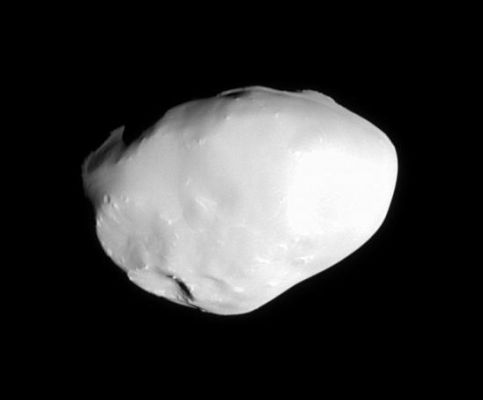 Telesto
The Cassini spacecraft passed within a cosmic stone's throw of Telesto in October, 2005 capturing this shot of the tiny Trojan moon. Telesto (24 Km, or 15 miles across) appears to be mantled in fine, icy material, although a few craters and some outcrops and/or large boulders are visible. Its smooth surface does not appear to retain the record of intense cratering that most of Saturn's other moons possess. 

The image was taken in polarized green light with the Cassini spacecraft narrow-angle camera on Oct. 11, 2005, at a distance of approx. 14.500 Km (9.000 miles) from Telesto. The image scale is 86 mt (about 283 feet) per pixel.
Parole chiave: Saturn's Moons - Telesto