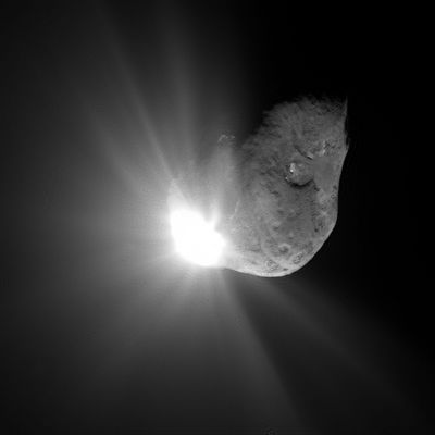 Deep-impact...67 seconds after collision!
caption NASA originale:"This spectacular image of comet Tempel 1 was taken 67 seconds after it obliterated Deep Impact's impactor spacecraft. The image was taken by the HR camera on the mission's flyby craft. Scattered light from the collision saturated the camera's detector, creating the bright splash seen here. Linear spokes of light radiate away from the impact site, while reflected sunlight illuminates most of the comet surface. The image reveals topographic features, including ridges, scalloped edges and possibly impact craters formed long ago".
Parole chiave: Comet Tempel-1