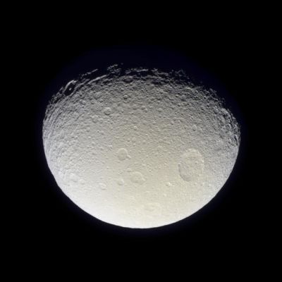 Tethys in natural colors (HD)
Commento NASA originale estratto da "NASA - Picture of the Day" del 29 Novembre 2004:"Tethys is one of the larger and closer moons of Saturn. The Cassini spacecraft now orbiting Saturn passed near the frozen moon at the end of October, capturing the most detailed images since the Voyager spacecrafts in the early 1980s. Tethys is composed almost completely of water ice and shows a large impact crater that nearly circles the planet. Because this crater did not disrupt the moon, Tethys is hypothesized to be at least partly liquid in its past. Two smaller moons, Telesto and Calypso, orbit Saturn just ahead of and behind Tethys. Giovanni Cassini discovered Tethys in 1684. The Cassini spacecraft is scheduled for a close fly-by of Tethys in September 2005". 
Parole chiave: Saturn's Moons - Tethys