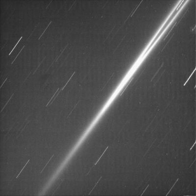 The G-Ring and "Star-Trails"
Caption NASA originale:"Cassini's ability to remain sharply pointed at its targets allowed this image of Saturn's faint, dusty G-Ring to be made. The thin streaks visible here are "Star-Trails", which are created during long exposures, when the spacecraft remains locked onto a single target. The camera shutter was open for 3 and 1/2 minutes during this particular exposure. A long exposure was required to see details of this quite tenuous Ring. 
The feature inside the G-Ring, at upper right, is also a star trail. 
The image was taken in polarized visible light with the Cassini spacecraft narrow-angle camera on March 7, 2005, at a distance of approx. 1,2 MKM (such as approx. 750.000 miles) from Saturn. The image scale is approx. 10 Km per pixel". 
Parole chiave: Saturn's Rings - The G-Ring