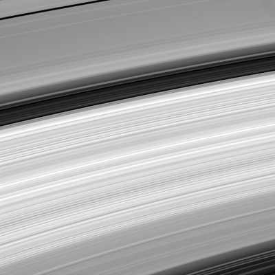 Close-up on the Rings!
Caption NASA originale:"This amazing close-up of Saturn's Rings reveals their incredible variety. In some regions there are wavelike structures, while in other places the Rings' structure appears to be more chaotic. 
This image shows (from top to bottom) the A-Ring with the Encke gap, the Cassini Division, the B-Ring and the C-Ring. 
The image was taken in visible light with the Cassini spacecraft narrow-angle camera on April 26, 2005, at a distance of approx. 2,3 MKM (such as 1,5 MMs) from Saturn. The image scale is 14 Km (approx. 8 miles) per pixel".
Parole chiave: Saturn's Rings