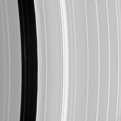 The "Encke Gap" in detail
Caption NASA:"Although the embedded moon Pan is nowhere to be seen, there is a bright clump-like feature visible here, within the Encke Division. 
Also discernable are periodic brightness variations along the outer (right side) gap edge. (...)
The view looks toward the sunlit side of the rings from about 17° below the Ring-Plane. 

The image was taken in visible light with the Cassini spacecraft narrow-angle camera on Sept. 9, 2006 at a distance of approx. 421.000 Km (about 261.000 miles) from Saturn. Image scale on the sky at the distance of Saturn is roughly 2 Km (1,4 miles) per pixel".
Parole chiave: Saturn's Rings - The Encke Gap in the "A" Ring