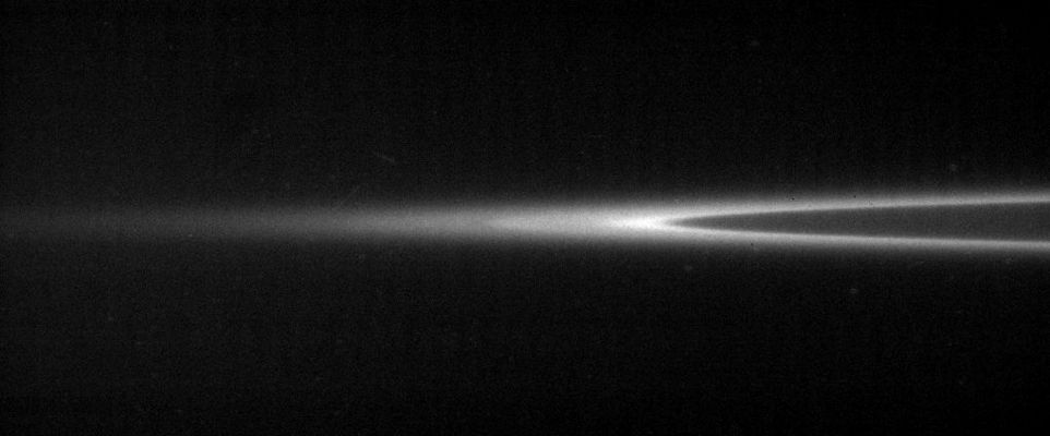 The G-Ring's "Glow"
Original caption:"Saturn's G-Ring glows like a neon garland in this lovely narrow angle camera image from Cassini. The comparison between the diffuse outer boundary and the sharp inner edge of this Ring, which consists of fine, dust-sized icy particles, is particularly noteworthy. Close Cassini views such as this should provide Ring scientists with clues about how this Ring is produced and confined. 

The G-Ring extends from 166.000 to 173.200 Km (about 103.100 to 107.600 miles) from Saturn's center. (remember: Saturn is 120.500 Km [about 74.900 miles] wide at its equator).

The image was taken in visible light with the Cassini narrow-angle camera on Oct. 24, 2005, at a distance of approx. 2,1 MKM (about 1,3 MMs) from Saturn. The image scale is 12 Km (about 8 miles) per pixel".
Parole chiave: Saturn's Rings - The "G-Ring"