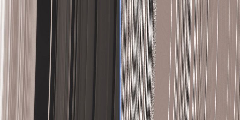 The Rings' texture
Caption NASA:"This close-up of the inner edge of the Cassini Division shows an enormous amount of structure, including a grainy texture in the bright outer B-Ring material near the gap edge. 
An extreme enhancement of the original image, presented at right, reveals the grainy region with greater clarity. 
This view looks toward the lit side of the rings from about 54° below the Ring-Plane. 

The image was taken in visible light with the Cassini spacecraft narrow-angle camera on Nov. 8, 2006 at a distance of approx. 378.000 Km (about 235.000 miles) from Saturn and at a Sun-Saturn-spacecraft, or phase, angle of 68°. 
Image scale is roughly 2 Km (a little more than 1 mile) per pixel".
Parole chiave: Saturn's Rings - The "Cassini Division"