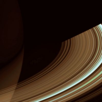 Multicolored Rings...
Caption NASA:"Both luminous and translucent the C-Ring sweeps out of the darkness of Saturn's shadow and obscures the Planet at lower left. 
The Ring is characterized by broad, isolated bright areas, or "plateaux", surrounded by fainter material. This view looks toward the unlit side of the Rings from about 19° above the Ring-Plane. North on Saturn is up. The dark, inner B-Ring is seen at lower right. 

The image was taken in visible light with the Cassini spacecraft wide-angle camera on Dec. 15, 2006 at a distance of approx. 632.000 Km (about 393.000 miles) from Saturn and at a phase angle of 56°. 
Image scale is roughly 34 Km (about 21 miles) per pixel".

Nota: il sistema di elaborazione in "colori naturali" non è cambiato ma, come vedete Voi stessi, i colori di Saturno sono (leggermente) mutati. Come mai? La risposta, a nostro parere, deve essere rinvenuta nel tipo di filtraggio utilizzato dalla NASA per l'ottenimento dell'immagine originale in b/n. Questo vuol dire, fra l'altro, che i frames in b/n NON sono affatto tutti uguali (come molti invece ritengono). E' il tipo di flitro impiegato per l'ottenimento dell'immagine originale - ottenuta sulla scala dei grigi - che poi determinerà, in sede di trasformazione del frame in immagine a colori, il "tipo di colori"!
Parole chiave: Saturn's Rings - The "C" and "B" Rings