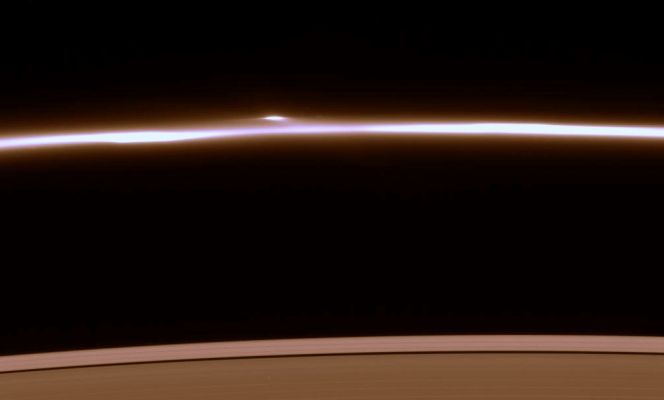 A huge clump in the F-Ring
Caption NASA:"The F-Ring dissolves into a fuzzy stream of particles -- rather different from its usual appearance of a narrow, bright core flanked by dimmer ringlets. 
Also notable here is the bright clump of material that flanks the Ring's core. 

This view looks toward the unlit side of the rings from about 58° above the Ring-Plane. 

The image was taken in visible light with the Cassini spacecraft narrow-angle camera on Feb. 10, 2007 at a distance of approx. 1,7 MKM (such about 1,1 MMs) from Saturn. Image scale is roughly 10 Km (about 6 miles) per pixel".
Parole chiave: Saturn's Rings - The "F" Ring