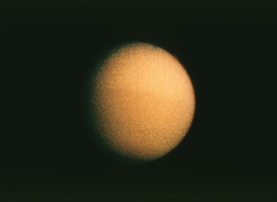 Titan from Voyager 2 (in HR)
Titan Data and Statistics 
Discovered by = Christiaan Huygens 
Date of discovery = 1655 
Mass (kg) = 1.35e+23 
Mass (Earth = 1) = 2.2590e-02 
Equatorial radius = 2.575 Km
Equatorial radius (Earth = 1) = 4.0373e-01 
Mean density (gm/cm^3) = 1,88 
Mean distance from Saturn = 1.221.850 Km 
Rotational period (days) = 15,94542 
Orbital period (days) = 15,94542 
Mean orbital velocity (km/sec) = 5,58 
Orbital inclination = 0,33° 
Escape velocity (km/sec) = 2,65 
Visual geometric albedo = 0,21 
Magnitude (Vo) = 8,28 
Mean surface temperature = -178°C 
Atmospheric pressure (bars) = 1,5
Parole chiave: Saturn's Moons - Titan