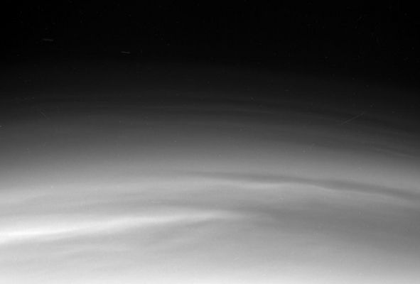 Over the Clouds of Titan
Caption NASA originale:"This image was taken during Cassini's 3rd close approach to Titan on Feb. 15, 2005. 
The image was taken with the Cassini spacecraft narrow angle camera through a filter sensitive to wavelengths of polarized infrared light centered at 338 nanometers. The image was acquired at a distance of approximately 151.000 Km (approx. 94.000 miles) from Titan and at a phase angle of 20°. 
Resolution in the image is about 900 meters (approx. 3.000 feet) per pixel".
Parole chiave: Saturn's Moons - Titan