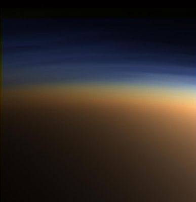 The Atmosphere of Titan
Caption NASA originale:"This natural color image shows Titan's upper atmosphere: an active place where methane molecules are being broken apart by solar ultraviolet light and the byproducts combine to form compounds like ethane and acetylene. The haze preferentially scatters blue and ultraviolet wavelengths of light, making its complex layered structure more easily visible at the shorter wavelengths used in this image. Lower down in the atmosphere, the haze turns into a globe-enshrouding smog of complex organic molecules. This thick, orange-colored haze absorbs visible sunlight, allowing only perhaps 10% of the light to reach the surface. The thick haze is also inefficient at holding in and then re-radiating infrared (thermal) energy back down to the surface. Thus, despite the fact that Titan has a thicker atmosphere than Earth, the thick global haze causes the greenhouse effect there to be somewhat weaker than it is on Earth". 
Parole chiave: Saturn's Moons - Titan