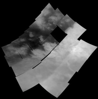 Titanian Clouds (October 2004 fly-by)
Caption NASA originale:"Cutting through the middle of the image is a sharp boundary between the bright region known as Xanadu Regio on the right and dark terrain to the left. Several smaller bright features, between 30 and 200 Km across are seen within the dark terrain. These intriguing features are a focus of further research and observations for Cassini scientists. One clue to their origin and history is the presence of bright "trails" within the dark material on the eastern sides of the bright spots. A mottled texture is seen within Xanadu, including dark, crisscrossing lines, suggestive of tectonic activity. No definitive craters have been found in these images, though several bright rings or circular features are seen in the dark terrain. However, without topographic shading, their identification as impact structures can not be confirmed. The images in this mosaic have been processed to enhance surface features and sharpen boundaries".
Parole chiave: Titan's mosaic
