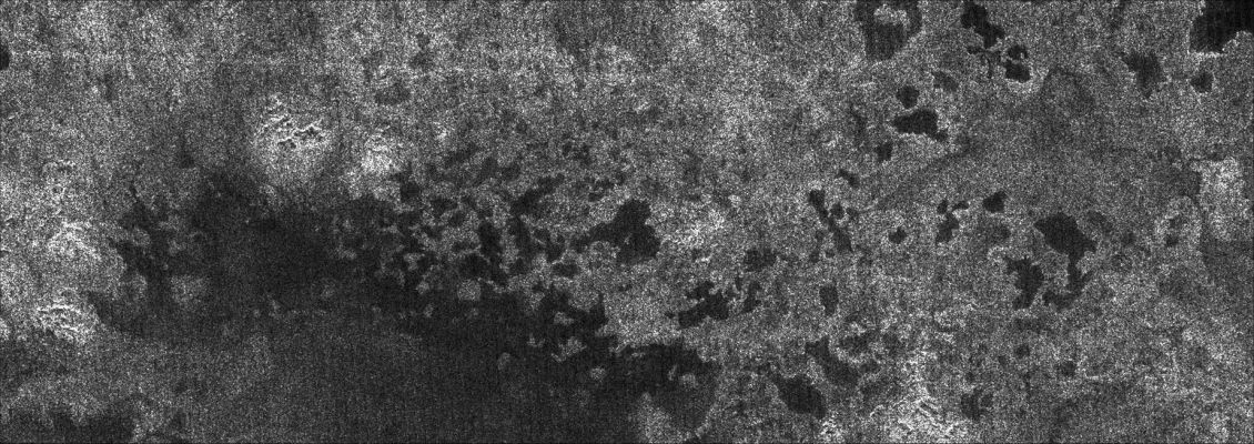 Titanian Northern Lakes (2)
Caption NASA originale:"For all these reasons, scientists interpret the dark areas as lakes of liquid methane or ethane, making Titan the only body in the Solar System besides Earth known to possess lakes. Because such lakes may wax and wane over time, and winds may alter the roughness of their surfaces. Repeat coverage of these areas should test whether indeed these are bodies of liquid. 

These two radar images were acquired by the Cassini radar instrument in synthetic aperture mode on July 21, 2006. 
The image (1) is centered near 80° North Lat. and 92° West Long.; it measures about 380x120 Km.
The image (2) is centered near 78° North Lat. and 18° West Long.; it measures about 425x120 Km.

Smallest details in this image are about 500 mt (roughly 1640 feet) across".
Parole chiave: Saturn's Moons - Titan