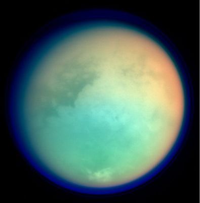 Titan (false colors)
Da "NASA - Picture of the Day" del 28.10.2004:"Normally hidden by a thick, hazy atmosphere, tantalizing features on Titan's surface appear in this false-color view. The image was recorded as the Cassini spacecraft approached its first close flyby of Saturn's smog-shrouded moon on October 26. Here, red and green colors represent specific infrared wavelengths absorbed by Titan's atmospheric methane while bright and dark surface areas are revealed in a more penetrating infrared band. Ultraviolet data showing the extensive upper atmosphere and haze layers is seen as blue. Sprawling across the 5.000 Km wide moon, the bright continent-sized feature known as "Xanadu" is near picture center, bordered at the left by contrasting dark terrain. 
Saturn orbiter Cassini and Titan lander Huygens plan further explorations, but for now the origin and nature of Titan's surface features remain unknown". 
...Unknown, per ora, diciamo noi...
Parole chiave: Saturn's Moons - Titan