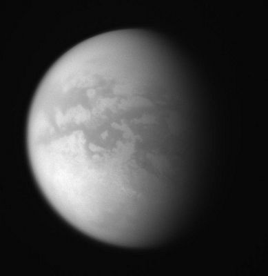 Titan
Caption NASA:"This remarkably clear view from that flyby shows the moon's characteristically dark Mid-Latitudes, and more Southern Terrain than the Cassini spacecraft has usually been able to glimpse. This was the first in a series of "illuminated outbound flybys" of Titan where the illuminated Hemisphere was visible following the closest approach. Cassini's flyby of Titan on July 22, 2006 sent the spacecraft into a more inclined orbit about Saturn. 

The image was taken in polarized infrared light with the Cassini spacecraft wide-angle camera on July 22, 2006 at a distance of approx. 148.000 Km (about 92.000 miles) from Titan. 
Image scale is roughly 9 Km (about 5 miles) per pixel".
Parole chiave: Saturn's Moons - Titan