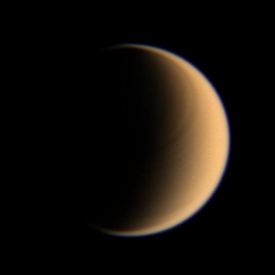 Titan (true colors - elab. NASA)
Caption NASA:"Looking toward high Northern Latitudes on Titan, the Cassini spacecraft spies a banded pattern encircling the Pole. 
This sort of feature is what scientists expect to see in the Stratosphere of Titan, where the Atmosphere is superrotating, or moving around the moon faster than the moon itself rotates. 

Images taken using red, green and blue spectral filters were combined to create this natural color view. The images were taken by the Cassini spacecraft wide-angle camera on Jan. 28, 2007 at a distance of approx. 196.000 Km (about 122.000 miles) from Titan. Image scale is 12 Km (approx. 7 miles) per pixel".
Parole chiave: Saturn's Moons - Titan