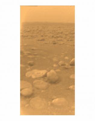 First real color view of Titan
Caption ESA originale:"This image was returned yesterday, 14 January 2005, by ESA's Huygens probe during its successful descent to land on Titan. This is the coloured view, following processing to add reflection spectra data, gives a better indication of the actual colour of the surface. Initially thought to be rocks or ice blocks, they are more pebble-sized. The two rock-like objects just below the middle of the image are about 15 cm(left) and 4 cm (centre) across respectively, at a distance of about 85 cm from Huygens. The surface is darker than originally expected, consisting of a mixture of water and hydrocarbon ice. There is also evidence of erosion at the base of these objects, indicating possible fluvial activity".
Parole chiave: Titan's surface