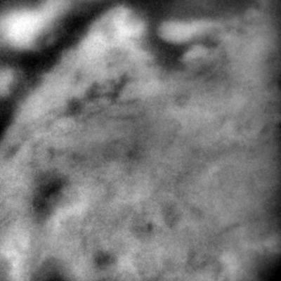 Unexplainable Surface Features
Caption NASA:"This image acquired at a range of 344.000 Km (about 213.700 miles) shows details at Titan's surface never seen before. The image shows only surface brightness no topographic shading. The finest features are less than 10 Km (a little more than 6 miles) across. In other areas the surface boundaries are less distinct perhaps due to different geologic process or atmospheric effects. There are some linear features that could be impact craters but the fact that many features are linear suggests that other geologic processes are shaping the surface".
Parole chiave: Saturn's Moons - Titan