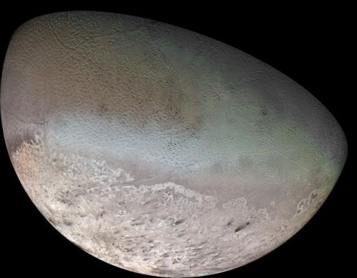 Triton (False Colors; credits: NASA/JPL/USGS)
Caption NASA originale:"The color was synthesized by combining HR images taken through orange, violet and ultraviolet filters; these images were displayed as red, green and blue images and combined to create this color version. With a radius of 1.350 Km, about 22% smaller than Earth's Moon, Triton is by far the largest satellite of Neptune. It is 1 of only 3 objects in the Solar System known to have a nitrogen-dominated atmosphere (the others are Earth and Saturn's giant moon, Titan). Triton has the coldest surface known anywhere in the Solar System (38 K, about -391 degrees F); it is so cold that most of Triton's nitrogen is condensed as frost, making it the only satellite in the Solar System known to have a surface made mainly of nitrogen ice. The pinkish deposits constitute a vast south polar cap believed to contain methane ice, which would have reacted under sunlight to form pink or red compounds. The dark streaks overlying these pink ices are believed to be an icy and perhaps carbonaceous dust deposited from huge geyser-like plumes, some of which were found to be active during the Voyager 2 flyby. The bluish-green band visible in this image extends all the way around Triton near the equator; it may consist of relatively fresh nitrogen frost deposits. The greenish areas includes what is called the cantaloupe terrain, whose origin is unknown, and a set of "cryovolcanic" landscapes apparently produced by icy-cold liquids (now frozen) erupted from Triton's interior".
Parole chiave: Neptune's Moons - Triton