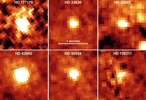 Suns like our Sun...
NASA's Spitzer Space Telescope recently captured these infrared images of six older stars with known planets. The yellow, fuzzy blobs are stars circled by disks of dust, or "debris disks," like the one that surrounds our own Sun. Though astronomers had predicted that stars with planets would harbor debris disks, they could not detect such disks until now: Spitzer was able to sense these dusty disks via their warm infrared glows. Specifically, the presence of the disks was inferred from an excess amount of infrared emission relative to what is emitted from the parent star alone. The stars themselves are similar in age and temperature to our Sun. In astronomical terms, they are stellar main sequence stars, with spectral types of F, G or K. These planet-bearing stars have a median age of 4 billion years. For reference, our Sun is classified as a G star, with an age of approximately 5 billion years. The disks surrounding these planetary systems are comprised of cool material, with temperatures less than 100 Kelvin (-173 degrees Celsius). They are10 times farther away from their parent stars than Earth is from the Sun, and are thought to be analogues of the comet-filled Kuiper Belt in our solar system. 
Parole chiave: From Space Images