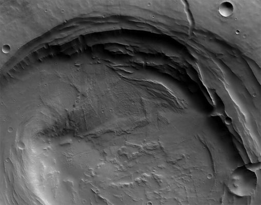 Biblis Patera (EDM - credits: ESA/DLR/FU Berlin (G. Neukum))
Original ESA caption:"This image taken by the High Resolution Stereo Camera (HRSC) on board ESA’s Mars Express spacecraft, shows the Biblis Patera Volcano, located in the Western part of the Tharsis rise on Mars. 
The HRSC obtained this image on 8 November 2004 during orbit 1034 with a ground resolution of approx. 10,8 mt per pixel. Its shows the region of Biblis Patera at approx. 2,0° North and 236,0° East. 
North is to the right".
Parole chiave: Mars from orbit - Volcanic Features - Paterae