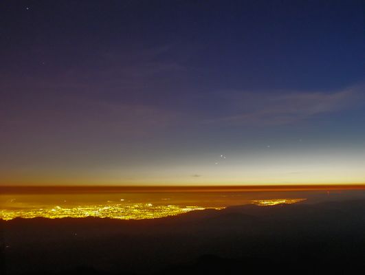 Mercury, Venus and Saturn in the Western Sky...Again!
Da "NASA - Picture of the Day" del 30 Giugno 2005:"Venus, Mercury, and Saturn wandered close together in western evening skies last week. On Saturday, June 25, astronomer R. Jay GaBany recorded this snapshot of their eye-catching planetary conjunction, from historic Lick Observatory on Mt. Hamilton, California, USA. The view looks toward the Pacific shortly after sunset with the lights of San Jose and the southern San Francisco Bay area in the foreground. Of course, Venus is the brightest of the trio. Mercury is nearby on the right and Saturn is below and left, closest to the horizon. Farther to the right of the planetary triangle are Pollux and Castor, twin stars of Gemini, with Regulus, bright star of the constellation Leo, at the very upper left corner of the picture. In the coming days, Venus and Mercury remain close, while Saturn continues to drop below them, toward the horizon".
Parole chiave: Artistic Pictures