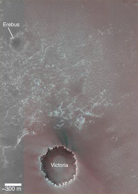 ...and all-the-way to Victoria! (HR)
Original caption:"The MER Opportunity initially examined sedimentary rock outcrops and sandy, windblown regolith within Eagle Crater; then it was driven by the Rover Team out of Eagle Crater and on into Endurance Crater. 
By the end of 2004, Opportunity left Endurance and started investigating the site where the Heatshield impacted the surface.

After that, the Rover spent much of the year 2005 driving from the Heatshield location down to the shallow Erebus Crater. 

Long-term plans call for driving Opportunity from Erebus to Victoria Crater, where a substantially thicker sequence of layered rock is expected to be found, relative to previous outcrops examined in the craters Endurance and Eagle". 

Location near: 2,0°S and 5,6° W  
300 mt scale bar = 984 ft  
Illumination from: left
Parole chiave: Mars from orbit - Meridiani Planum