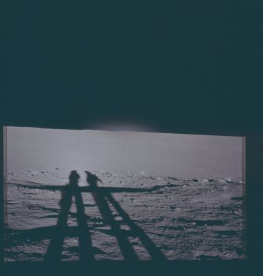 AS 12-46-6841 - Shadows and possible Anomaly (1)
Caption NASA originale:"118:18:09 MT - Leftward of 6840, showing the two shadows extended partway down the East wall. Pete Conrad, who is taking this partial pan, is on the left and Alan Bean is on the right. The crater immediately down-Sun of Conrad and Bean appears to have dug up blocks of local bedrock".

Parole chiave: Lunar Panorama - Surveyor Crater