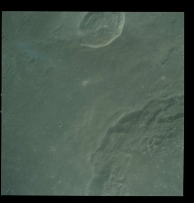 AS 12-51-7466 - Flying over Theophilus Crater (1)
Notes: Theophilus is a relatively young crater similar in size but slightly older than Copernicus. It lies on the eastern edge of the Kant Plateau, an elevated area in the Central Highlands along the North-Western margin of Mare Nectaris. 
Like Copernicus and Aristarchus, Theophilus has ruggedly terraced walls and a complex central peak protruding through a level floor. 
Smooth-surfaced material is present in "pools" at various levels on the terraces, on parts of the crater floor, and on the ejecta that blanket the North side of the Crater. As one alternative, the pools may have been emplaced as fluid lava. 
Parole chiave: The Moon from orbit - Crater Theophilus