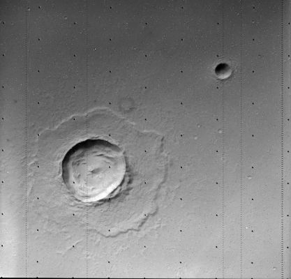 Mars: according to Viking 1 Orbiter
NASA's Viking Mission to Mars was composed of 2 spacecrafts: Viking 1 and Viking 2, each consisting of an Orbiter and a Lander. 
The primary mission objectives were to obtain HR images of the Martian surface, characterize the structure and composition of the atmosphere and surface, and search for evidence of life. Viking 1 was launched on August 20, 1975 and arrived at Mars on June 19, 1976. The first month of orbit was devoted to imaging the surface to find appropriate landing sites for the Viking Landers. On July 20, 1976 the Viking 1 Lander separated from the Orbiter and touched down at Chryse Planitia (22,48° N, 49,97° W planetographic, 1,5 Km below the datum - 0 elevation). Viking 2 was launched September 9, 1975 and entered Mars orbit on August 7, 1976. The Viking 2 Lander touched down at Utopia Planitia (47,97° N, 225,74° W, 3 Km below the datum) on September 3, 1976. The Orbiters imaged the entire surface of Mars at a resolution of 150 to 300 meters.
Parole chiave: Mars from orbit