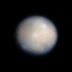 1-Ceres (natural colors, from HST - credits: NASA/ESA et al.)
The Hubble image of Ceres on the reveals bright and dark regions on the asteroid's surface that could be topographic features, such as craters, and/or areas containing different surface material. Large impacts may have caused some of these features and potentially added new material to the landscape. The Texas-sized asteroid holds about 30 to 40% of the mass in the Asteroid Belt.
Ceres' round shape suggests that its interior is layered like those of terrestrial planets such as Earth. The asteroid may have a rocky inner core, an icy mantle, and a thin, dusty outer crust. The asteroid may even have water locked beneath its surface. It is approx. 590 miles (950 Km) across and was the first asteroid discovered in 1801.
The observation was made in visible and ultraviolet light between December 2003 and January 2004 with the HST Advanced Camera for Surveys. The color variations in the image show either a difference in texture or composition on Ceres' surface. 

Astronomers need the close-up views of the Dawn spacecraft to determine the characteristics of these regional differences.

Parole chiave: From Space Images - Hubble Space Telescope - 1-Ceres