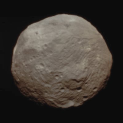 Features of 4- Vesta (Saturated Absolute Natural Colors; credits for the additional process. and color: Dr Paolo C. Fienga - Lunexit Team)
Caption NASA:"NASA's Dawn Spacecraft obtained this image of the giant Asteroid 4-Vesta with its framing camera on July, 9, 2011. It was taken from a distance of about 26.000 miles (approx. 41.000 Km). 4-Vesta is also considered a "protoplanet" because it is a large body that almost became a planet. Each pixel in the image corresponds to roughly 2,4 miles (about 3,8 Km).

The Dawn mission to 4-Vesta and 1-Ceres is managed by the Jet Propulsion Laboratory, for NASA's Science Mission Directorate, Washington, D.C. It is a project of the Discovery Program managed by NASA's Marshall Space Flight Center, Huntsville, Ala. UCLA, is responsible for overall Dawn mission science. Orbital Sciences Corporation of Dulles, Va., designed and built the Dawn Spacecraft!". 

Parole chiave: Asteroids - 4-Vesta