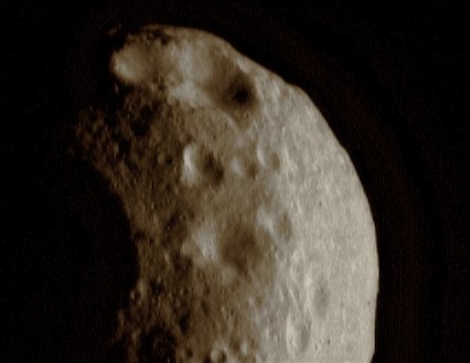 Old Craters (natural colors; credits: Lunexit)
Eros' many craters have a range of ages dating back to the last time the asteroid's surface was "wiped clean" by geologic processes. This NEAR Shoemaker image of the tip of the asteroid, taken March 6, 2000, from a range of 201 Km (about 125 miles), shows craters with a variety of shapes and sizes. 
When small craters first form, they typically have sharp rims and round floors. As they age, progressively smaller craters are superimposed, rounding the rims and pitting the walls and floors until the original underlying crater becomes almost unrecognizable. 

(Image 0127738155)
Parole chiave: Asteroids - 433-Eros
