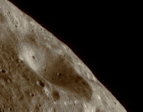 Up-close and personal (natural colors; credits: Lunexit)
Since April 11, 2000, the NEAR Shoemaker Spacecraft has orbited Eros at an altitude of about 100 Km (approx. 62 miles) from the Asteroid's Center. Images acquired from this orbit will be used to make a HR map of the illuminated portion of the Asteroid. Each spot on the surface will be imaged under a variety of lighting and viewing conditions to bring out different features. 

In this image, taken April 17, 2000, from a height of 101 Km (approx. 63 miles), the shadows highlight small-scale surface features. The surface is pockmarked with craters ranging in size up to the 2,8-Km (1,74-mile) diameter crater in the center of the image. The smallest craters which can be resolved are about 20 meters (65 feet) across. 

In lower right corner of the image, 20-meter boulders can be seen that were not evident in images from higher altitudes. 

(Image 0131288775)
Parole chiave: Asteroids - 433-Eros