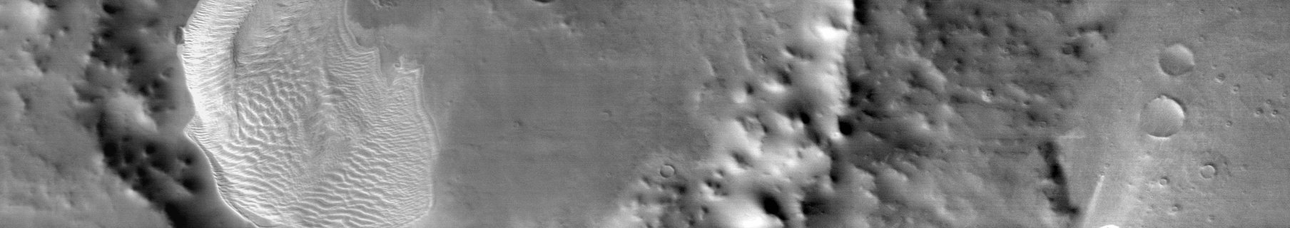 The "Warm Sands" of Charlier Crater (IR Image)
Caption NASA:"This daytime IR image shows the large sand sheet on the Floor of Charlier Crater. The brightness is due to the warmth of the sand during the day".

Coord.: 68,9° South Lat. and 190,6° East Long.
Parole chiave: Mars from orbit - Craters - Charlier Crater