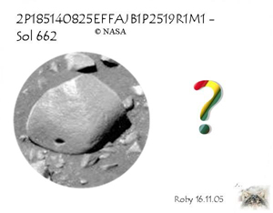 Hole-Rock: is that a "shell" or an "egg"?!?
Un esempio assolutamente ovvio ed eclatante di roccia anomala: in questo caso, come vedete, l'Anomalìa è data dal foro, di forma diremmo quasi perfettamente circolare, che caratterizza il lato corto della pietra.

L'immagine non ha una buona risoluzione e quindi potremmo sbagliarci, ma la nostra sensazione è che il buco si apra su una roccia cava, la cui porzione esterna potrebbe anche essere piuttosto sottile. 
Stiamo guardando una sorta di "uovo" Marziano? 
Il rivestimento esterno della pseudo-roccia è soltanto un "guscio"?

Questo, come ovvio, non lo sa nessuno e quindi, ancora una volta, la definizione del rilievo come "Pseudo-Roccia" a noi sembra davvero perfetta!
Parole chiave: Martian Surface - Rocks, Sand and Debris - Controversial