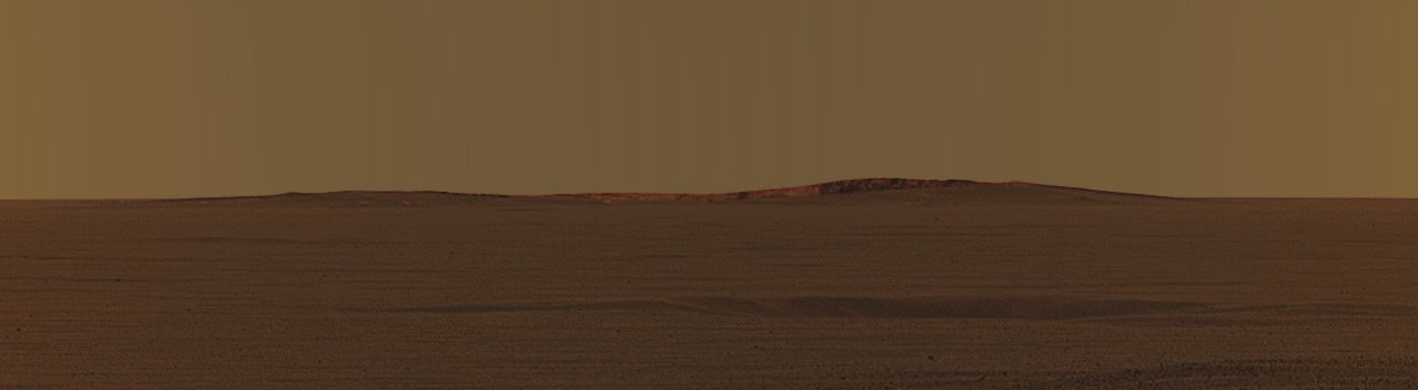 Skyline, with Endurance Crater in the distance - Sol 32 (Approx. True Colors; credits for the additional process. and color.: Dr Paolo C. Fienga - Lunexit Team)
Caption NASA:"This image taken by the Mars Exploration Rover Opportunity's PanCam shows the Eastern Plains that stretch beyond the small Crater where the Rover Landed. In the distance, the Rim of a larger Crater dubbed "Endurance" can be seen. This mosaic was taken on the 32nd Martian Day, or Sol, of the Rover's mission and spans 20° of the Local Horizon. It was taken while Opportunity was parked at the North end of the Outcrop, in front of the rock region dubbed "El Capitan", and facing East.
The features seen at the horizon are the near and far rims of "Endurance," the largest crater within about 6 Km (approx. 4 miles) of the Lander. Using orbital data from the Mars Orbiter Camera on NASA's Mars Global Surveyor Spacecraft, scientists estimated the crater to be approx. 160 meters (175 yards) in diameter, and about 720 meters (half a mile) away from the Lander. The highest point visible on Endurance is the highest point on the far Inner Wall of the Crater; the Sun is illuminating the inside of the Wall itself.ù
Between the location where the image was taken at "El Capitan" and "Endurance" are the flat, smooth Meridiani Plains, which scientists believe are blanketed in the Iron-bearing mineral called Hematite. The dark horizontal feature near the bottom of the picture is a small, approx. 5-meter (16-feet) Crater, only 50 meters (164 feet) from Opportunity's present position. When the Rover leaves the Crater some 2 to 3 weeks from now, Endurance will be the destinations".
Parole chiave: Martian Horizon - Meridiani Planum - Endurance Crater