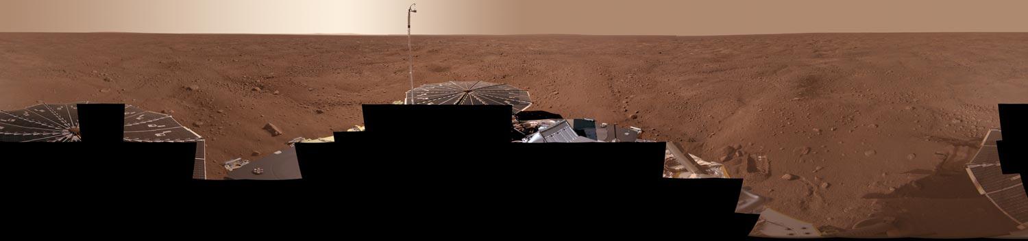 Full-circle panorama (Approx. True Colors - credits: NASA)
Caption NASA:"This view combines more than 400 images taken during the first several weeks after NASA's Phoenix Mars Lander arrived on an arctic plain at 68,22° North Lat., 234,25° East Long. on Mars. 

The full-circle panorama in approximately true color shows the polygonal patterning of ground at the landing area, similar to patterns in permafrost areas on Earth. The center of the image is the westward part of the scene. Trenches where Phoenix's robotic arm has been exposing subsurface material are visible in the right half of the image. The spacecraft's meteorology mast, topped by the telltale wind gauge, extends into the sky portion of the panorama. 

This view comprises more than 100 different camera pointings, with images taken through three different filters at each pointing. It is presented here as a cylindrical projection".
Parole chiave: Mars Panorama - Vastitas Borealis