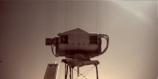 Surface Stereo Imager on Mars, Face-On - Sol 116 (MULTISPECTRUM; credits: Lunexit)
Caption NASA:"This image is a view of NASA's Phoenix Mars Lander's Surface Stereo Imager (SSI) as seen by the Lander's Robotic Arm Camera. This image was taken on the afternoon of the 116th Martian Day, or Sol, of the Mission (September 22, 2008). 
The mast-mounted SSI, which provided the images used in the 360 degree panoramic view of Phoenix's Landing Site, is about 4" tall and 8 inches long. 
The two "eyes" of the SSI seen in this image can take photos to create 3-dimensional views of the landing site".
Parole chiave: Spacecraft - Phoenix Lander - Surface Stereo Imager